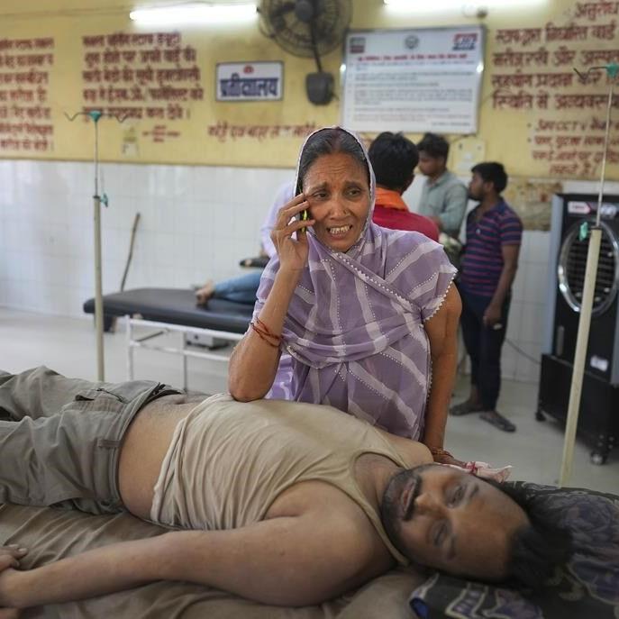 Days of sweltering heat, power cuts in northern India overwhelm hospitals as death toll climbs